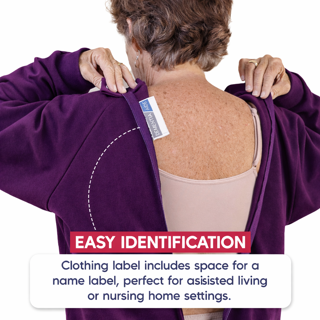 Person wearing a purple adaptive anti-strip garment with an attached label, emphasizing easy identification.