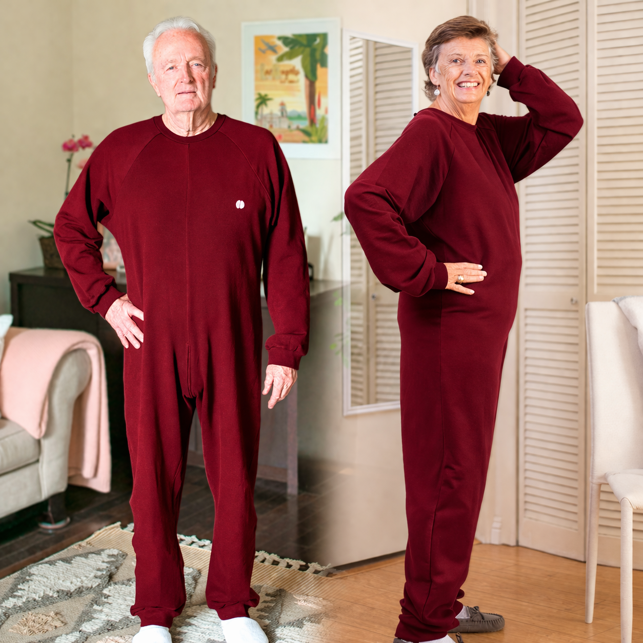 Two people wearing matching burgundy anti strip jumpsuits in a living room setting.